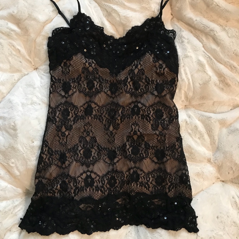 Adorable black lace and sequin stretch tank top.